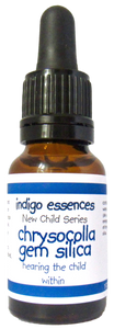 Bottle of indigo essences chrysocolla gem silica on a white background