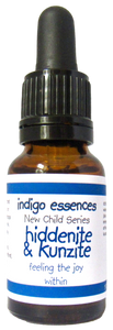 Bottle of indigo essences New Child Series with dropper labeled 'hiddenite & Kunzite'.