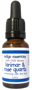 Bottle of indigo essences with dropper labeled 'larimar & rose quartz' on a white background