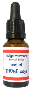 Bottle of 'indigo essences' with a label reading 'one of THOSE days' on a white background