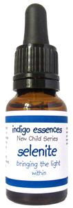 Bottle of indigo essences selenite with a blue label on a white background